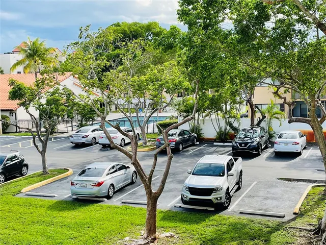 a childrens park with lots of swings and slides