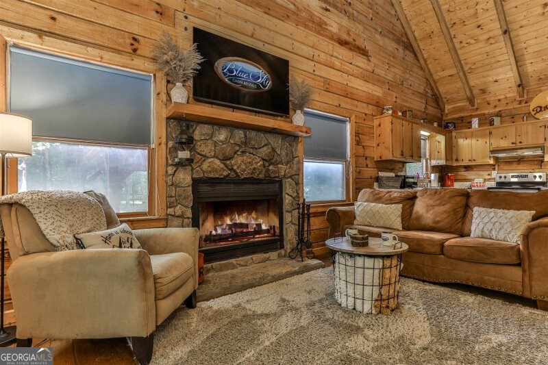 420 Olivers Trail Cherry Log, GA 30522 - Photo 6 of 27 a living room with furniture and a fireplace