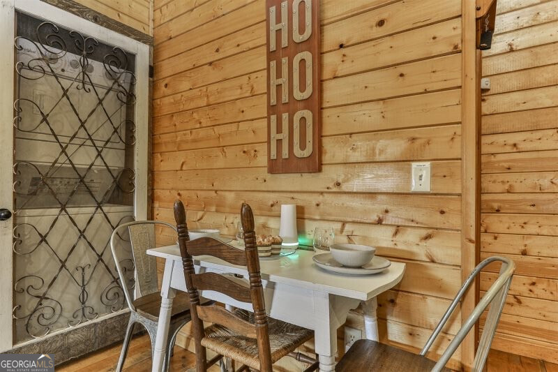 420 Olivers Trail Cherry Log, GA 30522 - Photo 7 of 27 a view of a table and chairs in an empty room