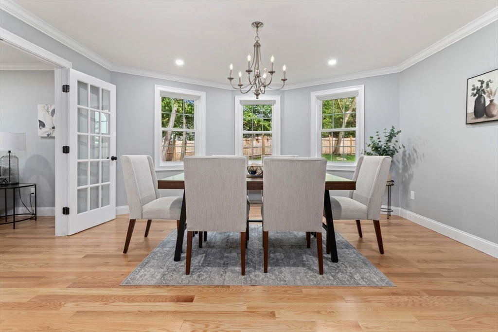 21 McCullough Road Saugus, MA 01906 - Photo 17 of 41 a view of a dining room with furniture window and wooden floor