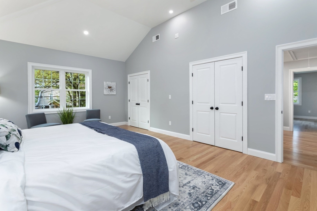 21 McCullough Road Saugus, MA 01906 - Photo 24 of 41 a bedroom with a bed and a dresser