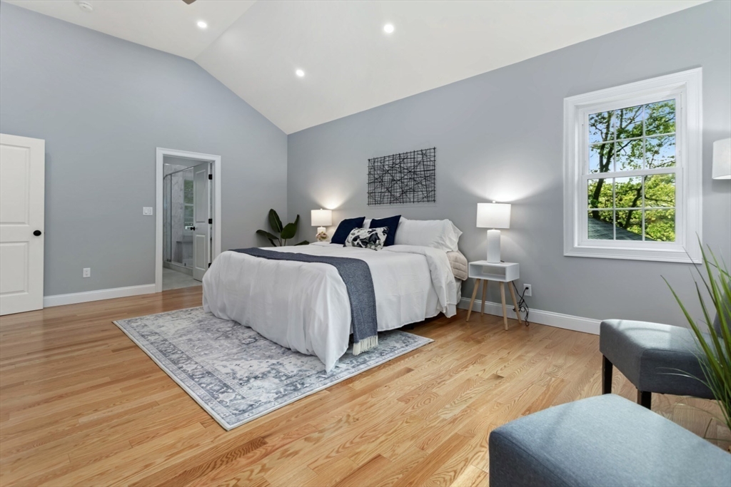 21 McCullough Road Saugus, MA 01906 - Photo 25 of 41 a bedroom with a bed and a couch