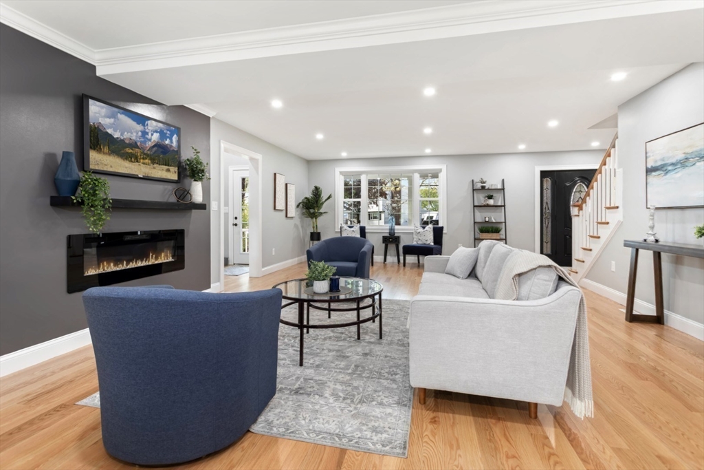 21 McCullough Road Saugus, MA 01906 - Photo 10 of 41 a living room with furniture and a flat screen tv