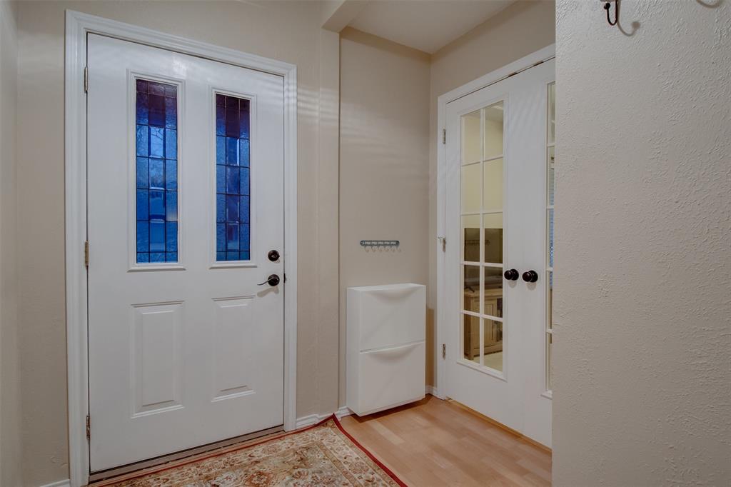 5718 Sagebrush Trail Arlington, TX 76017 - Photo 2 of 26 a view of wooden door