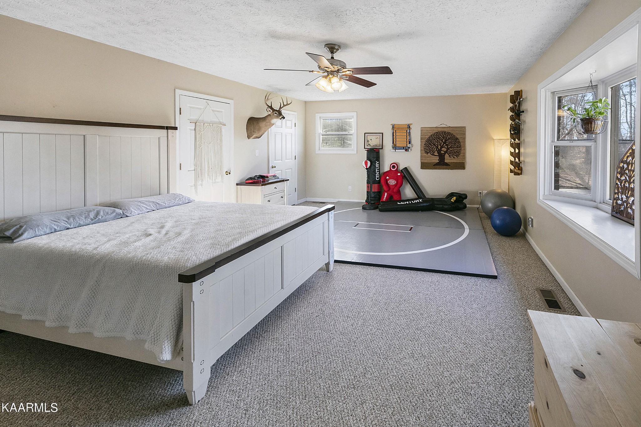 1434 Cunningham Road West Seymour, TN 37865 - Photo 18 of 31 a bed room with a bed and a chandelier