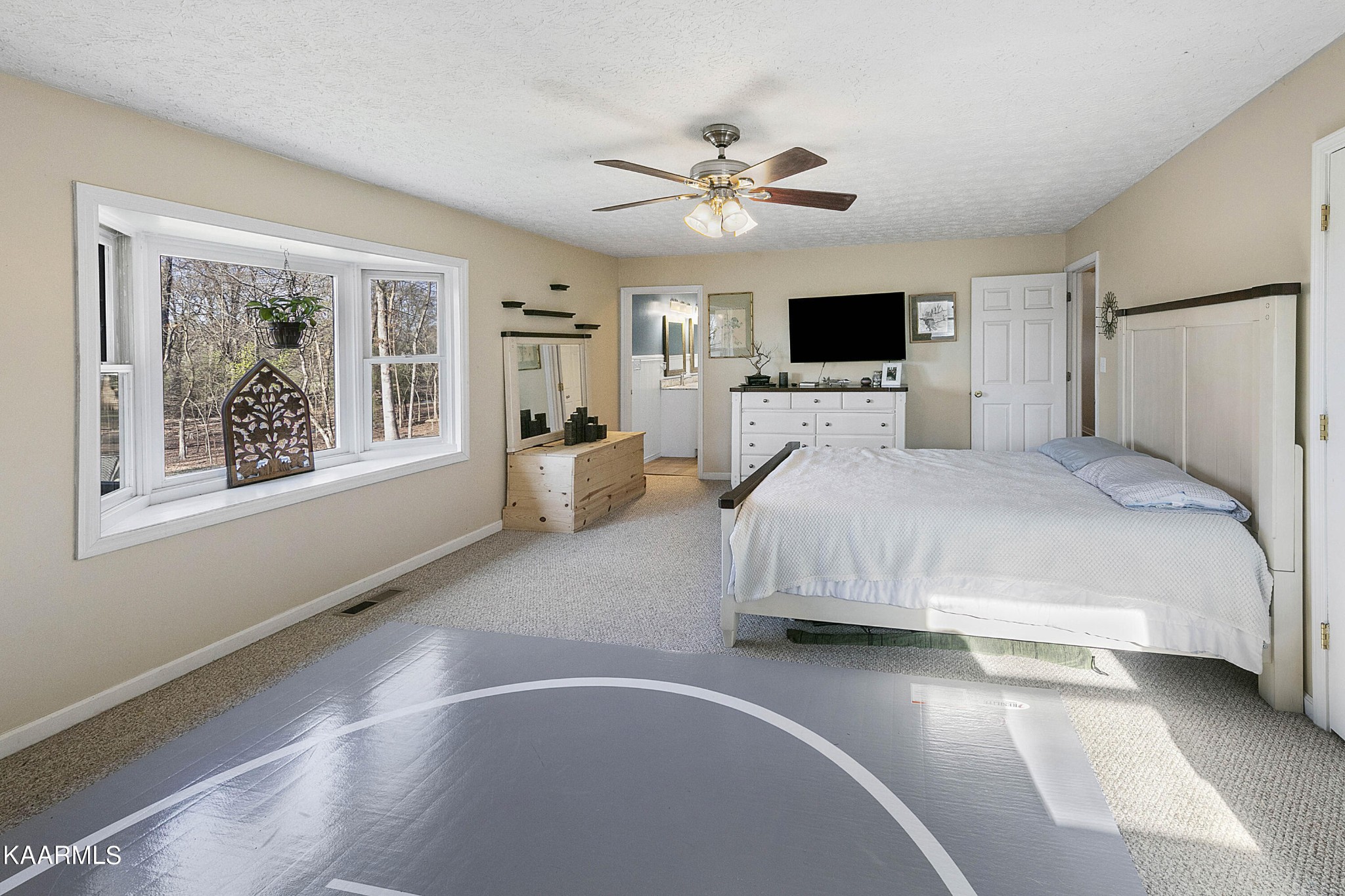 1434 Cunningham Road West Seymour, TN 37865 - Photo 19 of 31 a bedroom with a large bed and a window