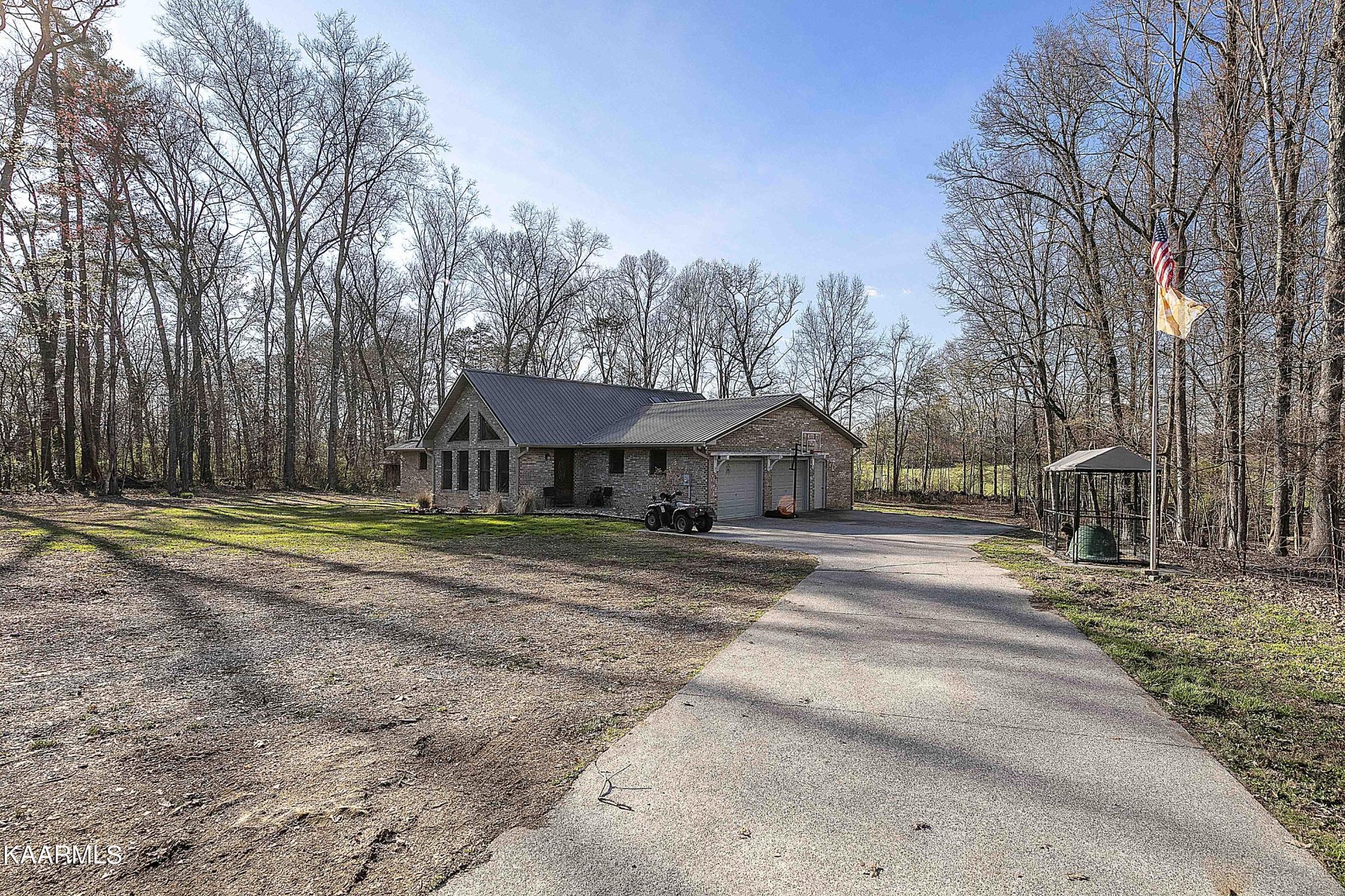 1434 Cunningham Road West Seymour, TN 37865 - Photo 2 of 31 a view of a house with a yard and large trees