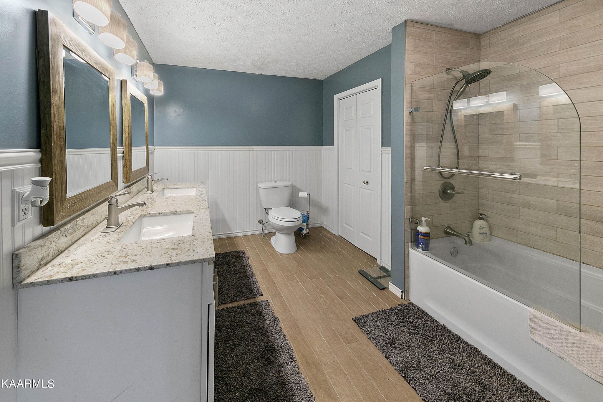 1434 Cunningham Road West Seymour, TN 37865 - Photo 21 of 31 a bathroom with a granite countertop sink mirror and a bathtub