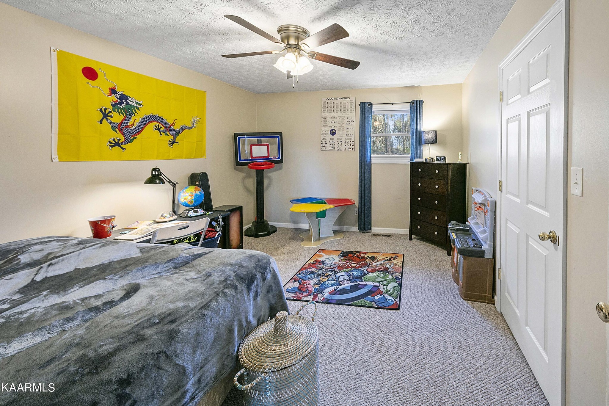 1434 Cunningham Road West Seymour, TN 37865 - Photo 22 of 31 a bedroom that has a bed and a chandelier