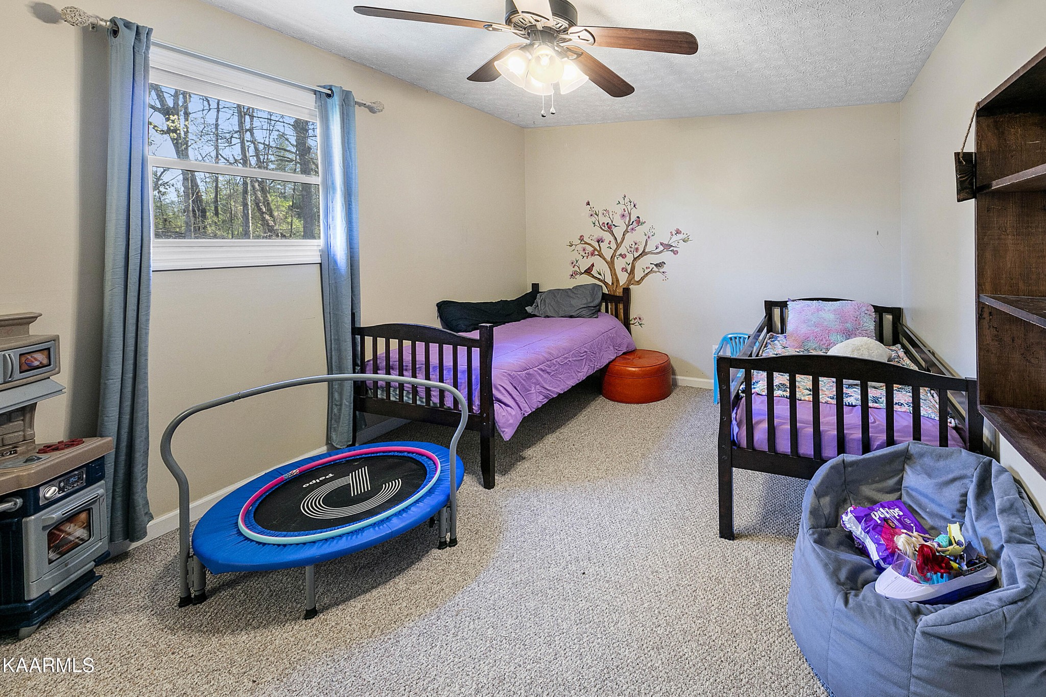 1434 Cunningham Road West Seymour, TN 37865 - Photo 23 of 31 a bedroom with furniture and a chandelier