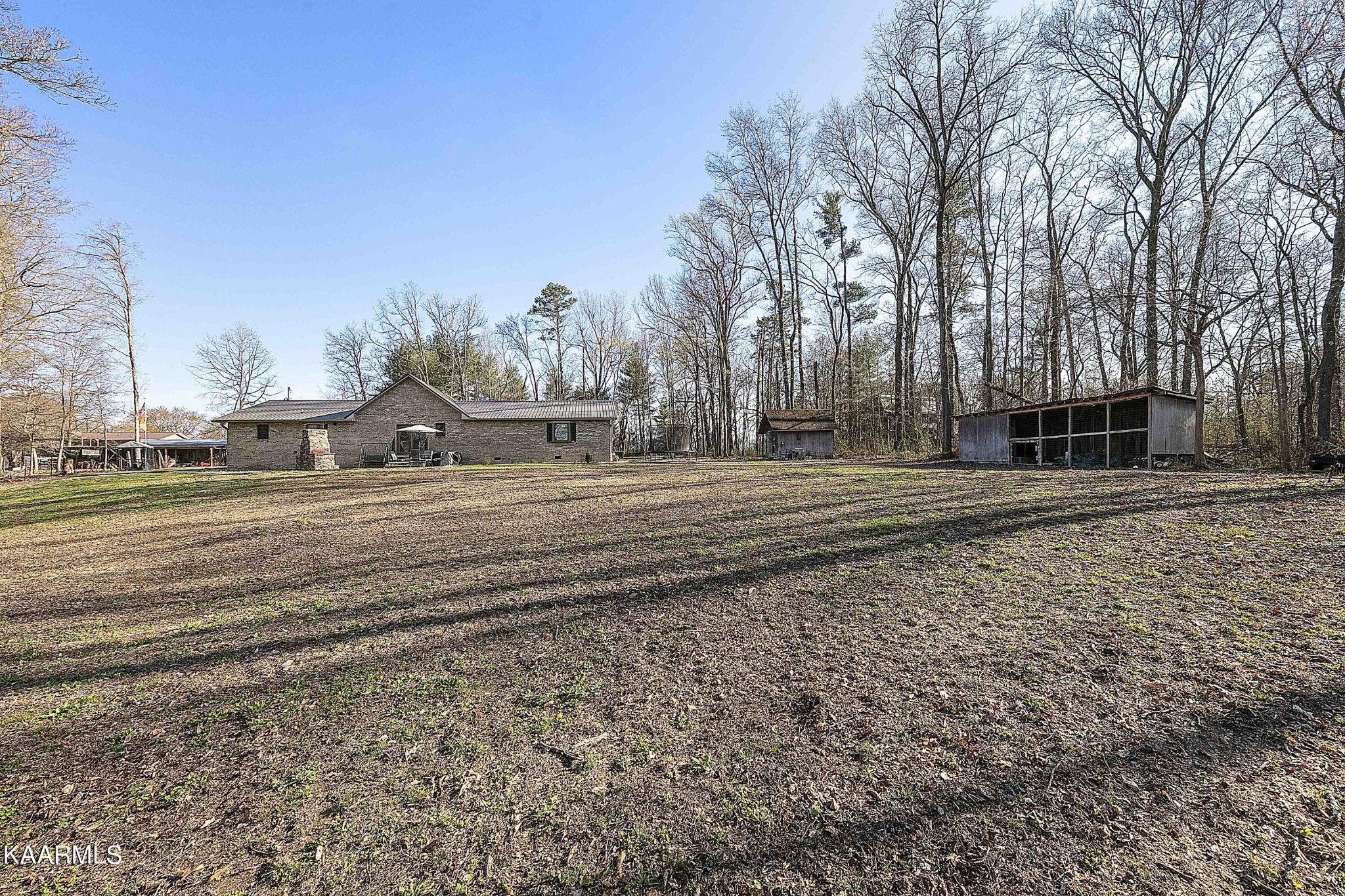 1434 Cunningham Road West Seymour, TN 37865 - Photo 30 of 31 a backyard of a house with lots of green space