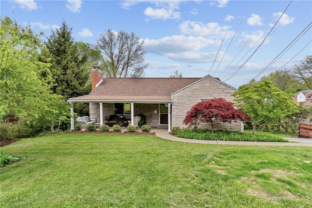 466 Haverhill Road Pittsburgh, PA 15228 - Photo 1 of 41 a view of a house with a yard porch and sitting area