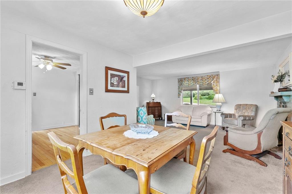 466 Haverhill Road Pittsburgh, PA 15228 - Photo 18 of 41 a view of a dining room with furniture and a window