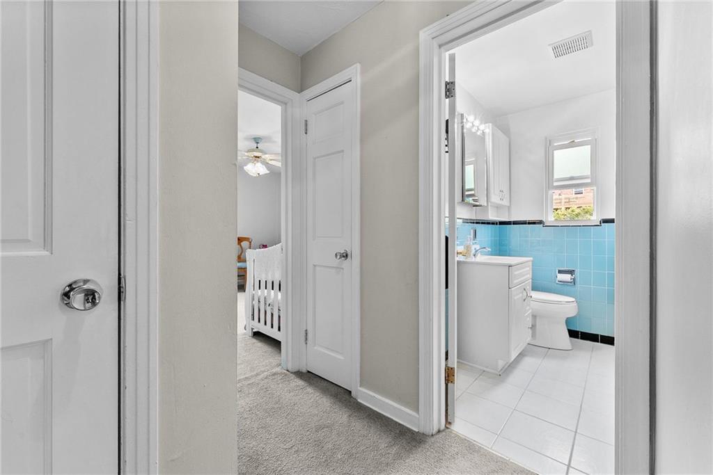 466 Haverhill Road Pittsburgh, PA 15228 - Photo 21 of 41 a bathroom with a sink and a mirror