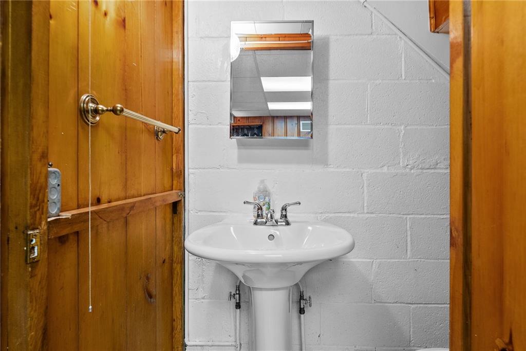 466 Haverhill Road Pittsburgh, PA 15228 - Photo 31 of 41 a bathroom with a sink a mirror and shower