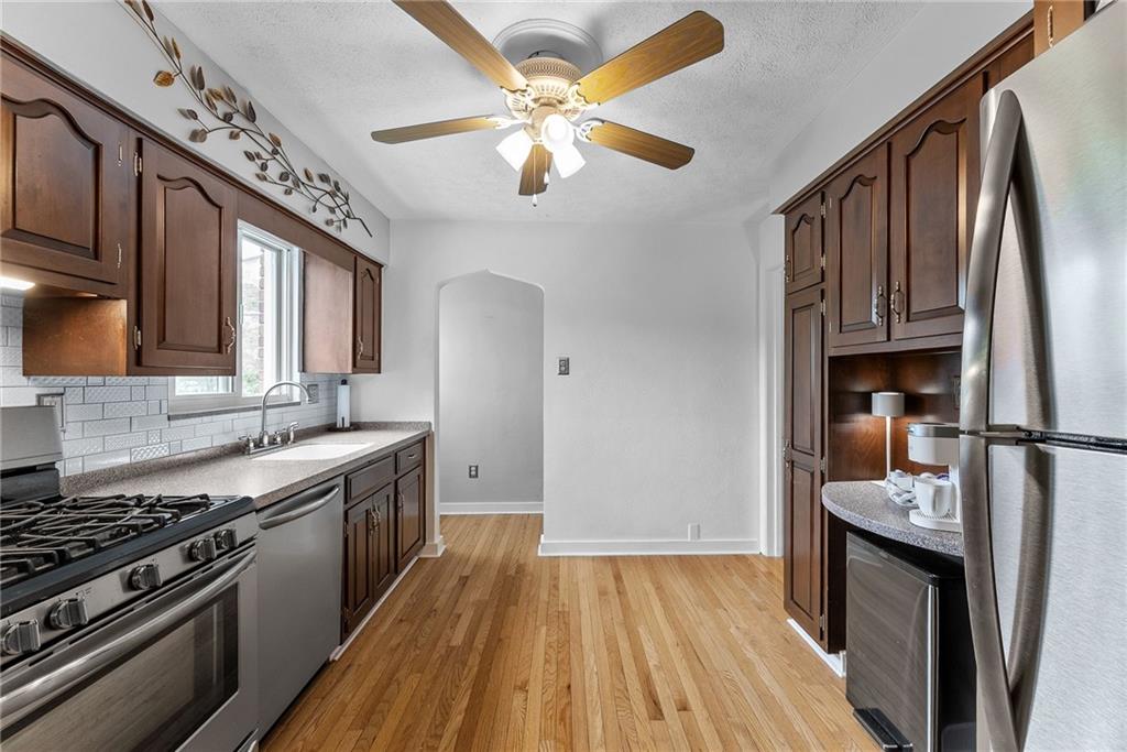466 Haverhill Road Pittsburgh, PA 15228 - Photo 6 of 41 a kitchen with stove and cabinets