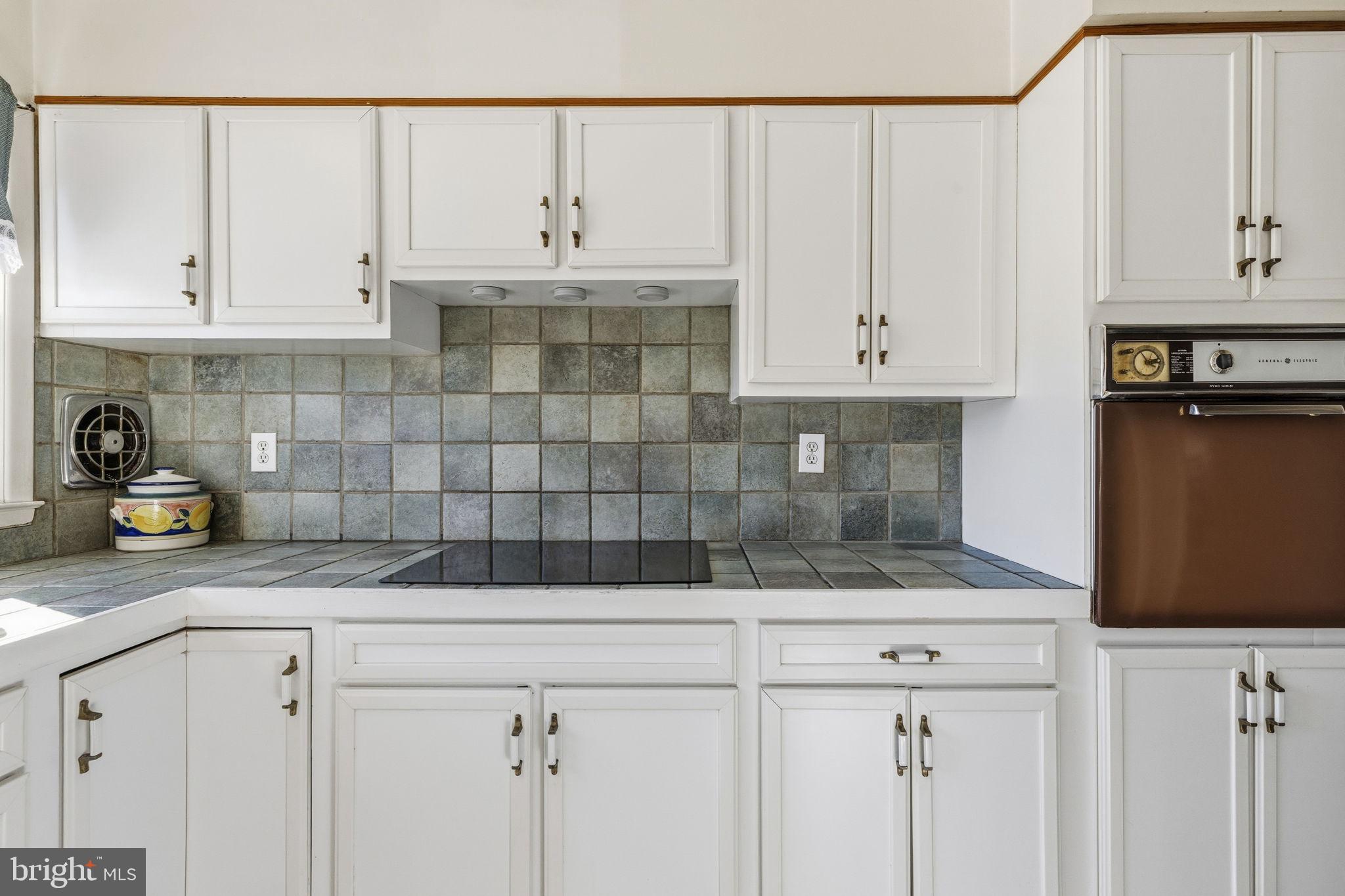 3001 Merrymans Mill Road Phoenix, MD 21131 - Photo 9 of 46 a kitchen with a sink and cabinets