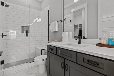 a view of a dining room with furniture and window