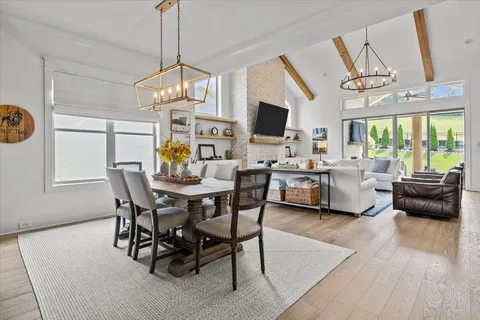 a room that has a lot of cabinets and a wooden floor
