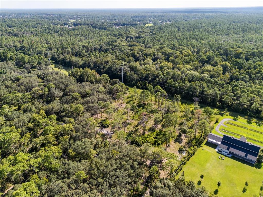Markham Woods Rd Lake Lake Mary, FL 32746 - Photo 7 of 9 an aerial view of a house with a yard