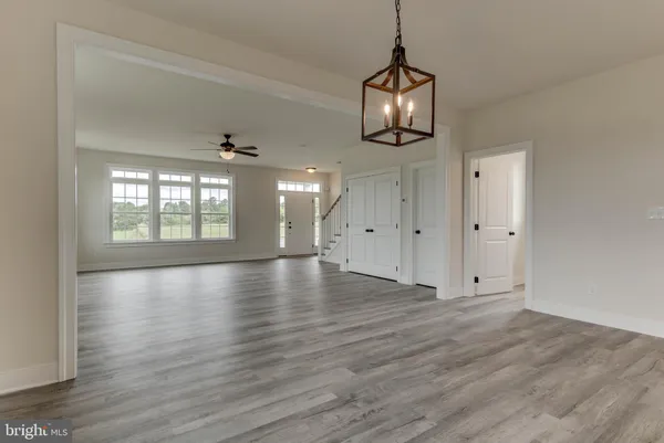 a view of a hallway with entryway