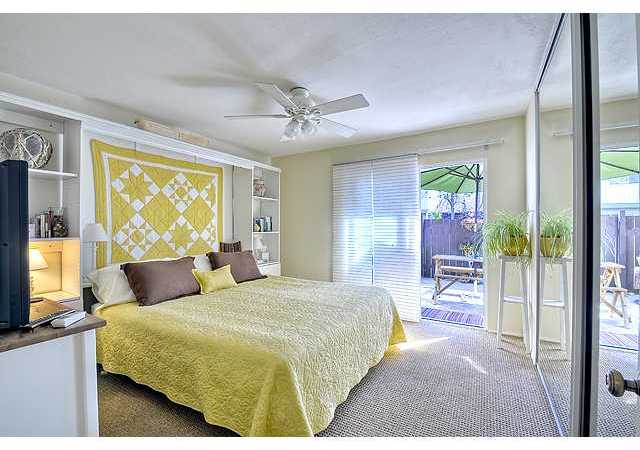 1751 Red Barn Road Encinitas, CA 92024 - Photo 8 of 15 MASTER BEDROOM WITH DUAL PANE SLIDING DOOR OUT TO YOUR PRIVATE PATIO/YARD. 9' CLOSET WITH MIRROR DOORS.