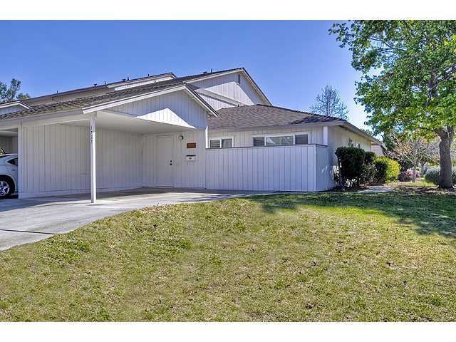 1751 Red Barn Road Encinitas, CA 92024 - Photo 10 of 15 CARPORT CAN BE CONVERTED TO 1 CAR GARAGE WITH HOA APPROVAL. THERE IS A STORAGE ROOM (SEE THE DOOR) AT THE END OF THE CARPORT. ALSO AN ENCLOSED AREA TO THE RIGHT OF THE CARPORT FOR GARBAGE CANS, BICYCLES, ETC.