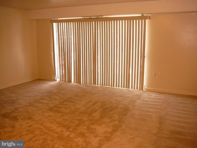 3340 Hewitt Avenue, Unit 66 3 Silver Spring, MD 20906 - Photo 7 of 13 Living Room
