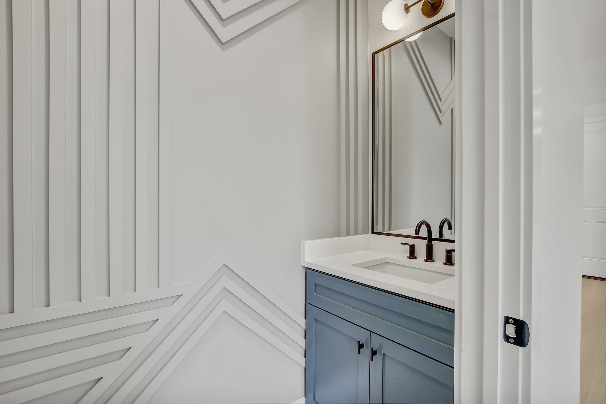 4127 East 12th Street, Unit 8 Austin, TX 78721 - Photo 15 of 32 a bathroom with a sink vanity and a mirror