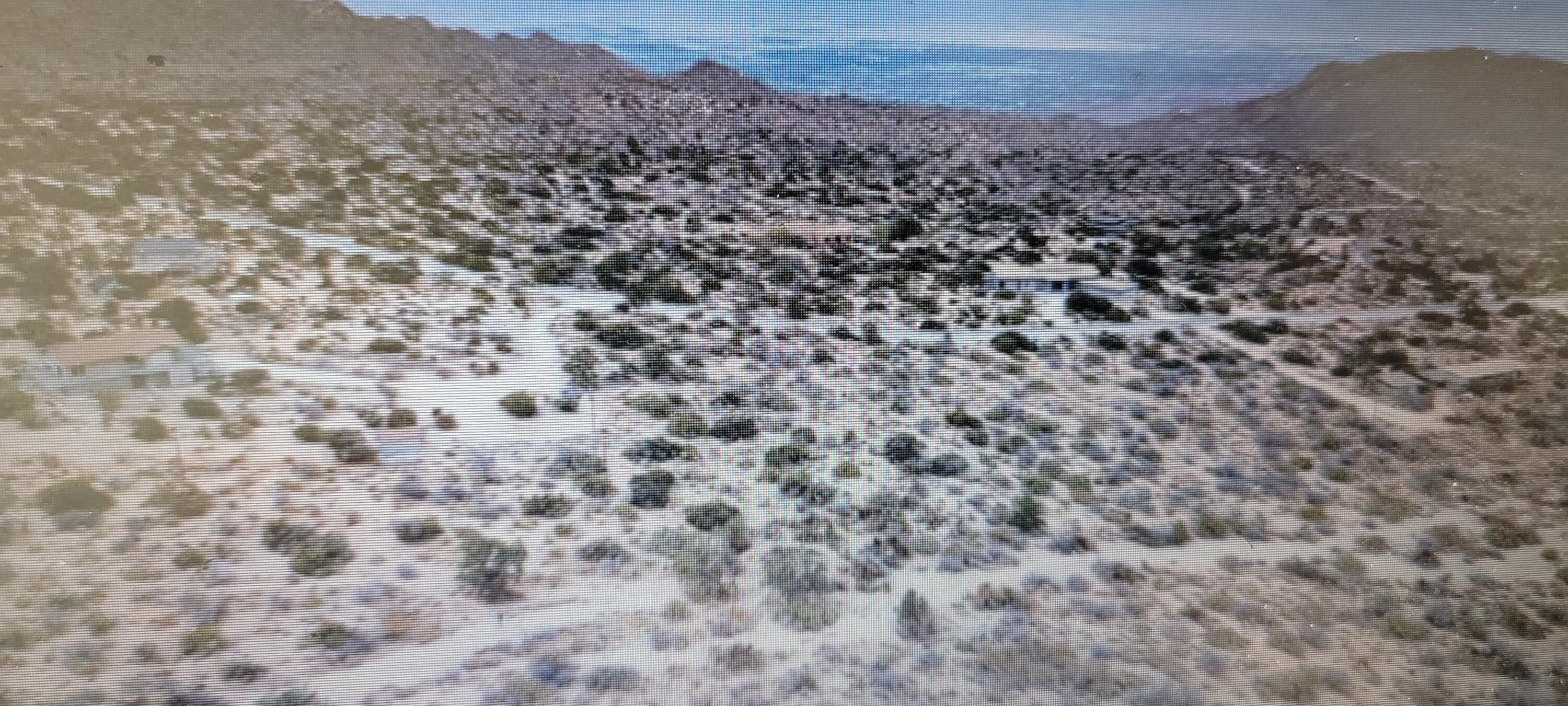 0 Waterwell Road Mountain Center, CA 92561 - Photo 3 of 4 a large stone wall with a mountain in the background