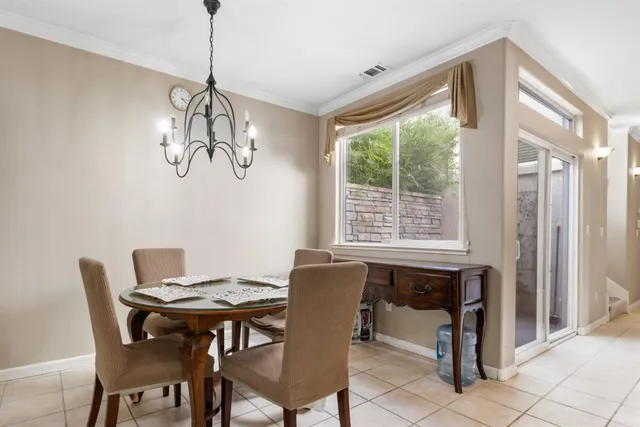 a kitchen with stainless steel appliances a stove and a refrigerator