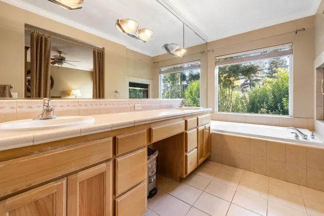 a view of a bathroom from a hallway