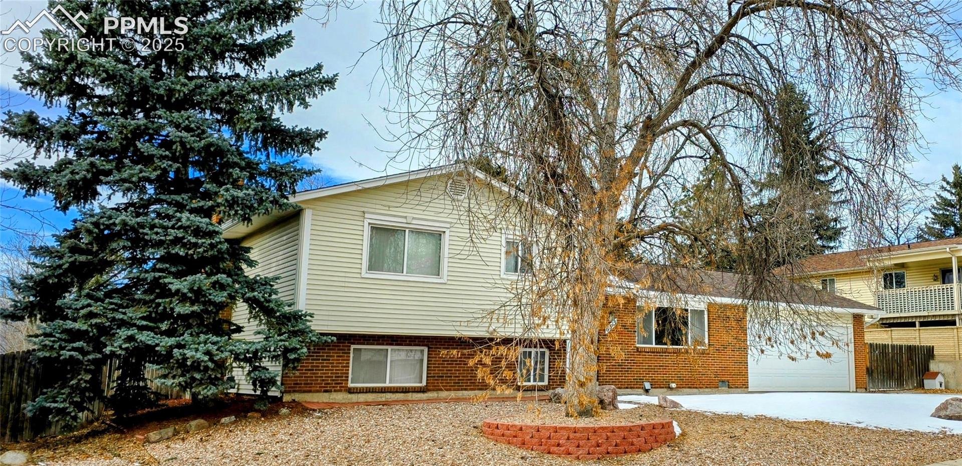 6313 Chippewa Road Colorado Springs, CO 80915 - Photo 1 of 36 View of tri-level home