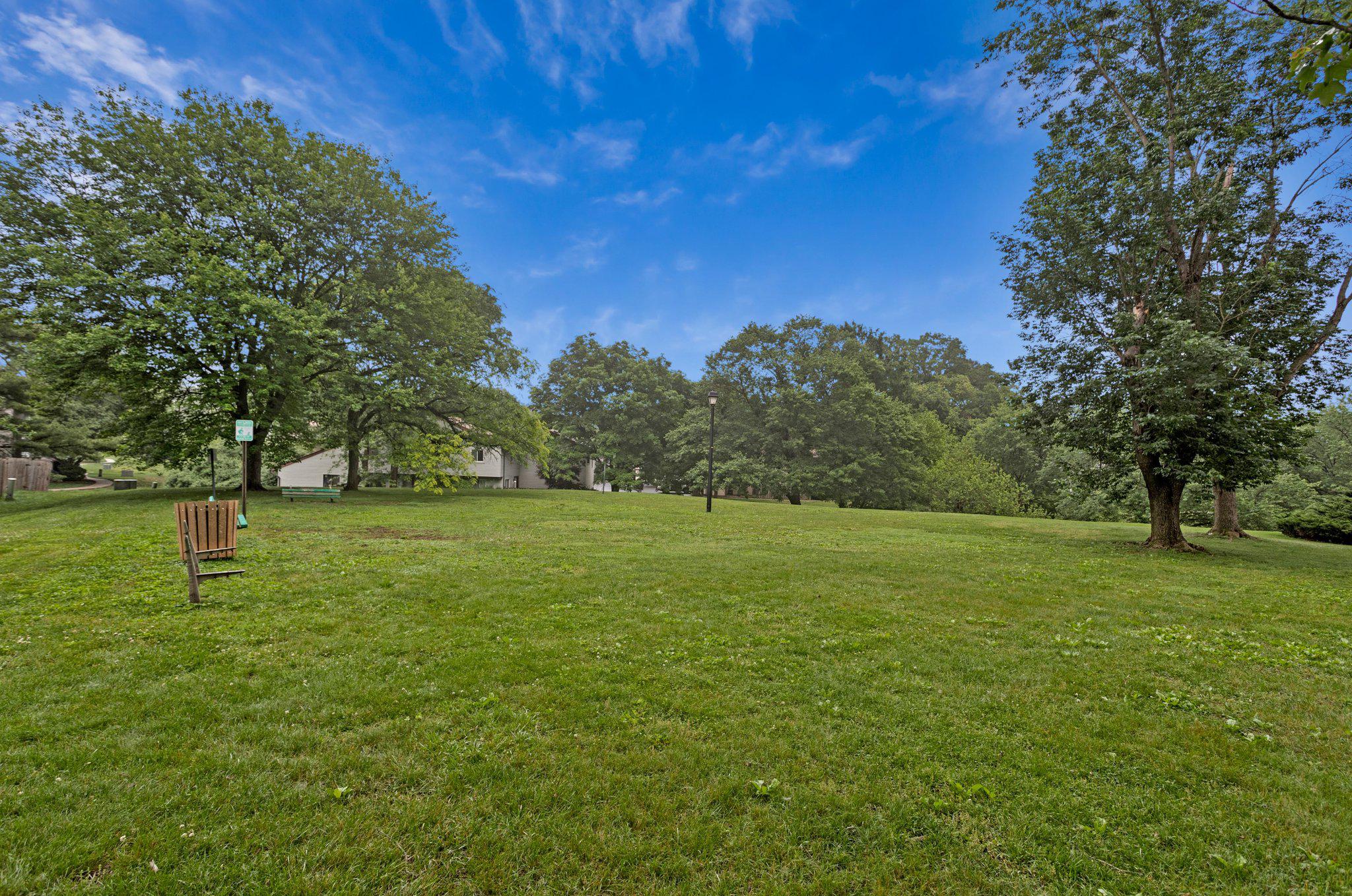 1675 Ridgely Court, Unit 182 Crofton, MD 21114 - Photo 44 of 47 a view of outdoor space with green field and trees