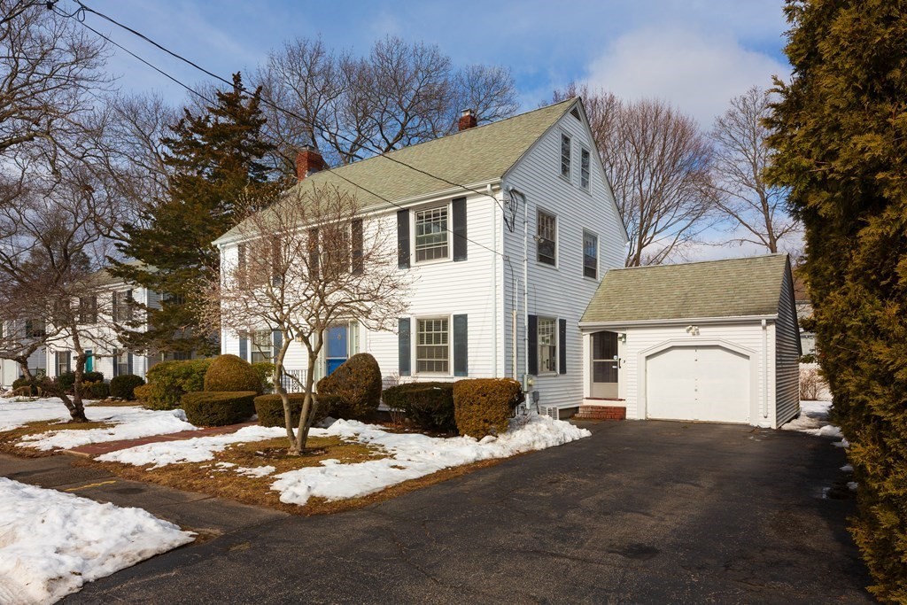 7 Gordon Road Milton, MA 02186 - Photo 1 of 17 a view of a white house with a yard