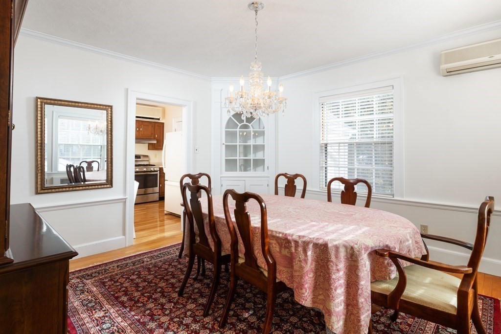 7 Gordon Road Milton, MA 02186 - Photo 6 of 17 a view of a dining room with furniture and window