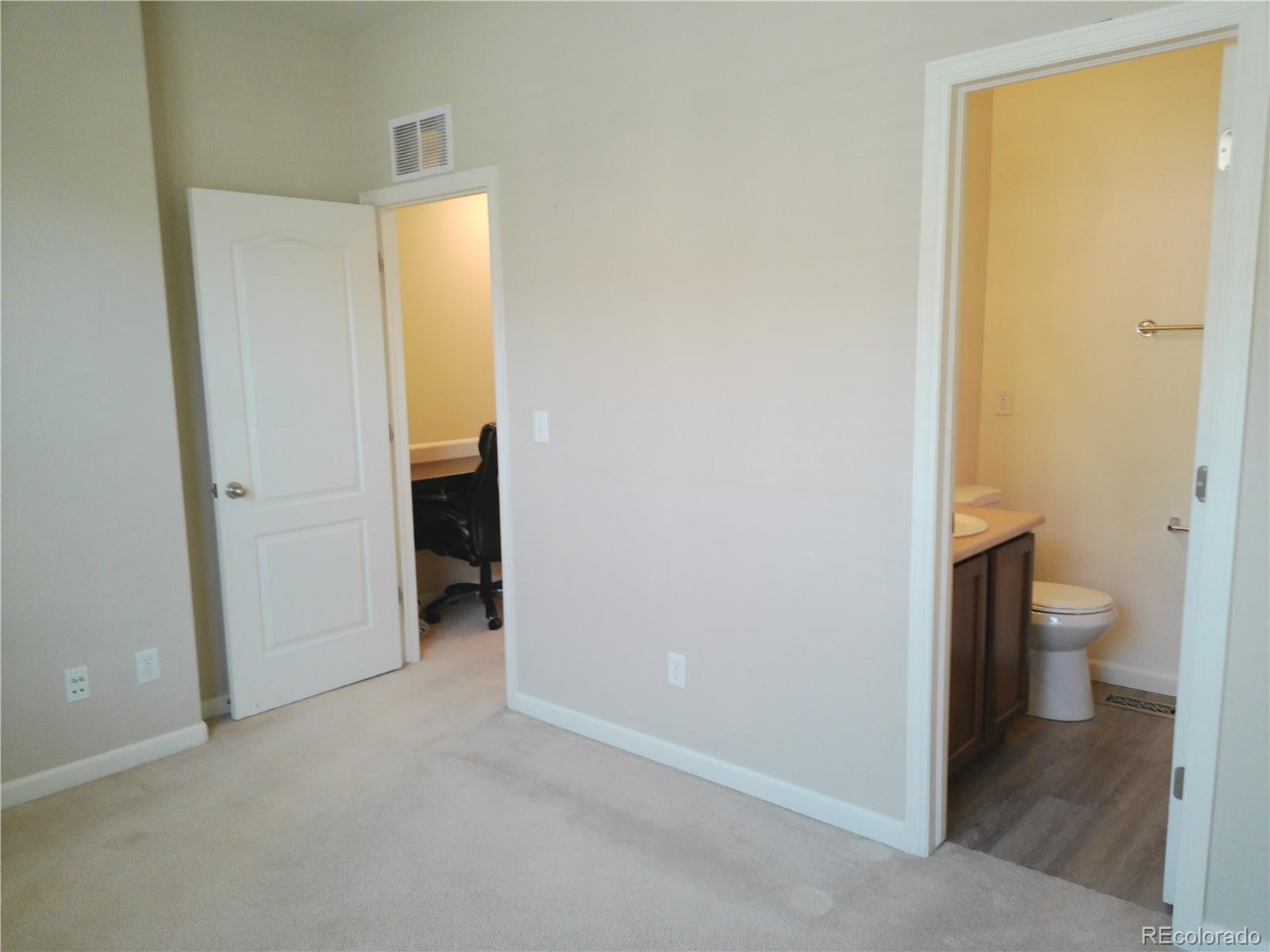 4714 ROWLAND Heights Colorado Springs, CO 80923 - Photo 30 of 41 a bathroom with a toilet