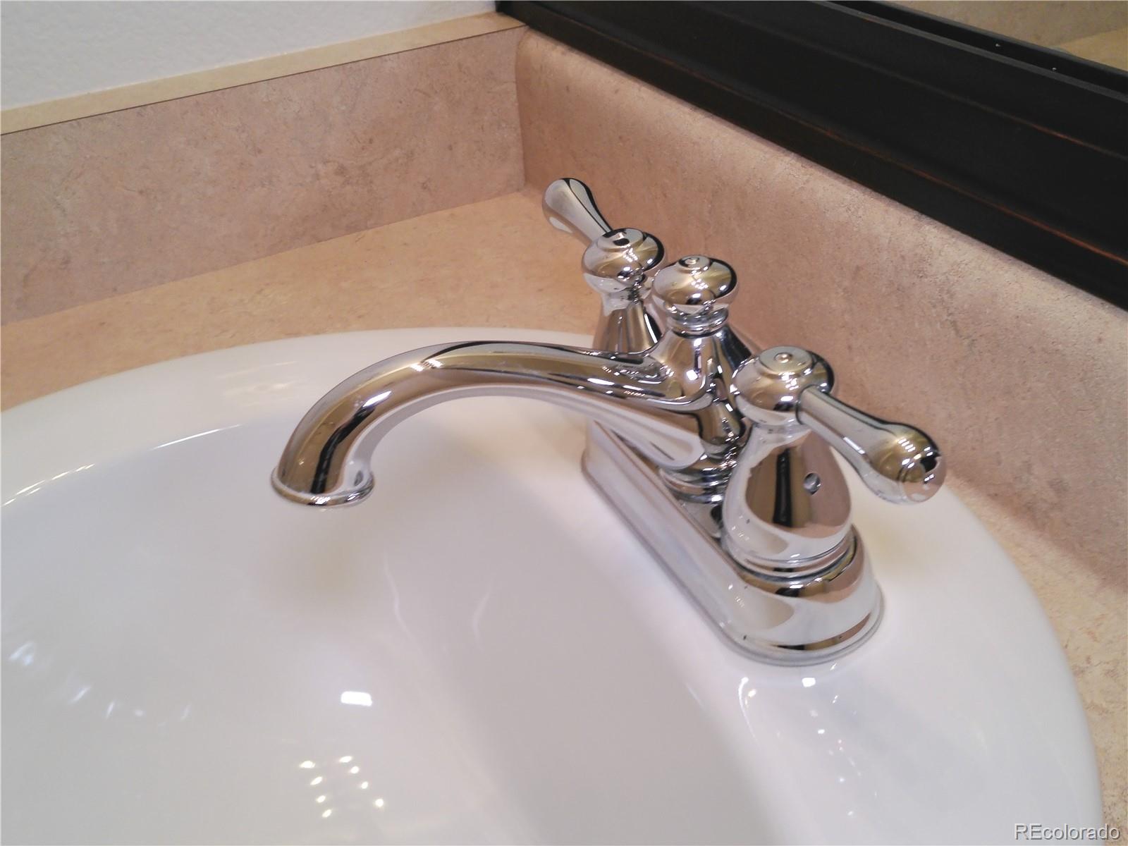 4714 ROWLAND Heights Colorado Springs, CO 80923 - Photo 32 of 41 a close view of sink in the kitchen
