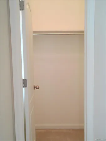 a picture of a rug and white wall