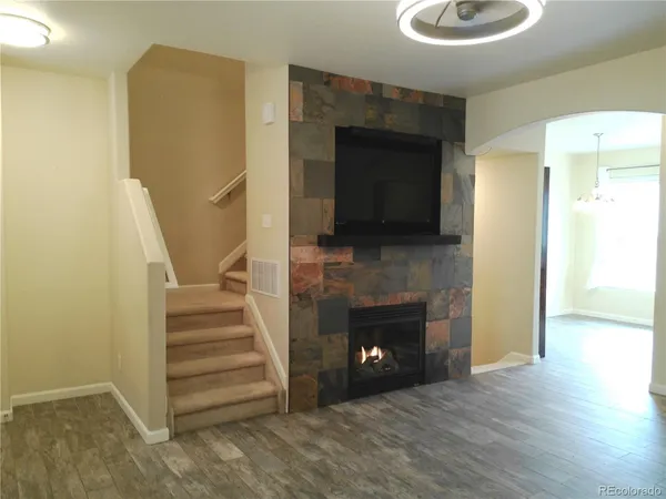a view of a livingroom with a fireplace