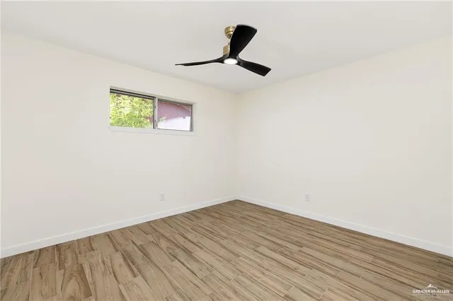 a house with swimming pool in front of it