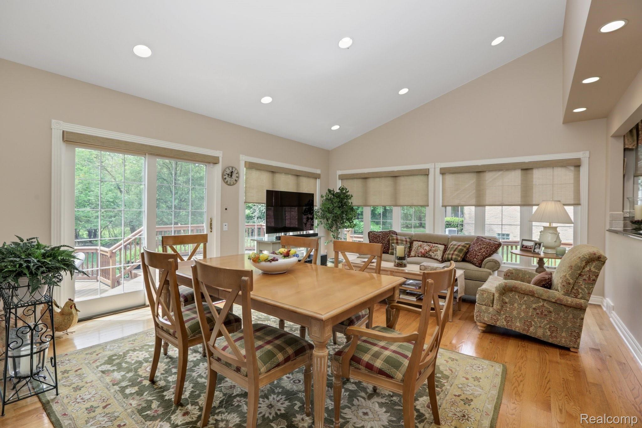 4808 Rivers Edge Drive Troy, MI 48098 - Photo 13 of 40 Family room w/ vaulted ceiling and beautiful natural light overlooking the expansive backyard