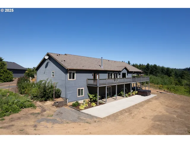 a view of a house with a big yard