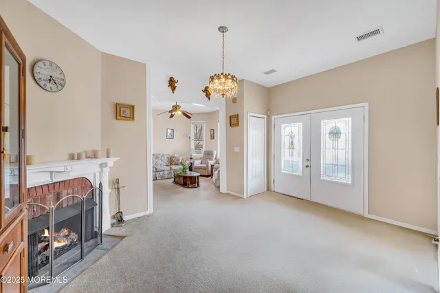 a view of a livingroom with furniture and windows