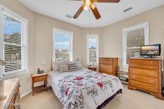 a bedroom with a bed and furniture