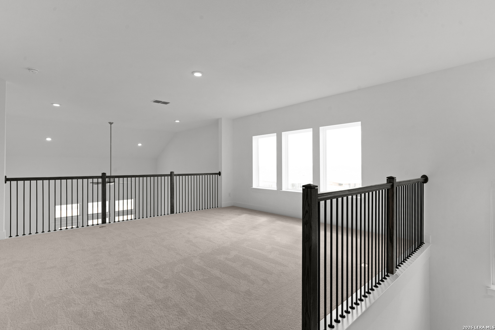 940 Nolte Bend Seguin, TX 78155 - Photo 10 of 19 a view of an empty room with windows