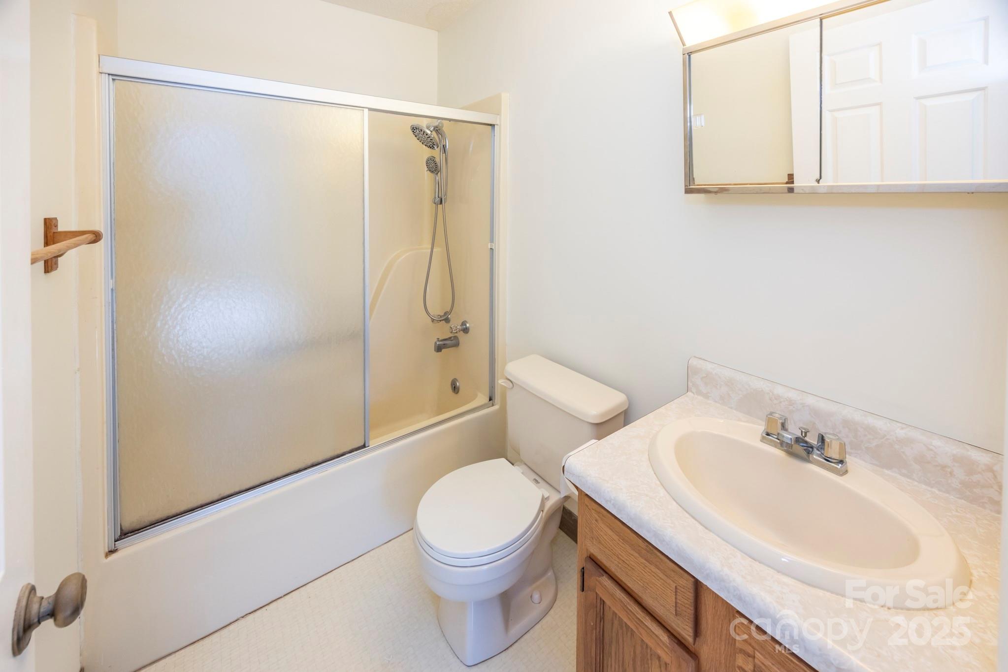 395 Thompson Road Rutherfordton, NC 28139 - Photo 14 of 25 a bathroom with a sink a toilet and shower