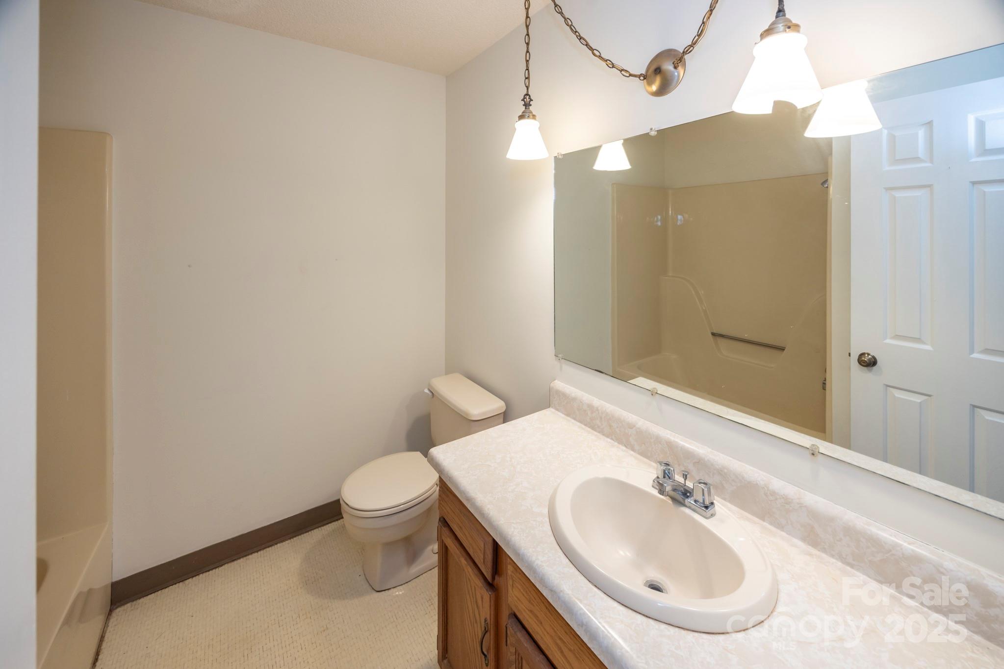 395 Thompson Road Rutherfordton, NC 28139 - Photo 18 of 25 a bathroom with a sink and a mirror