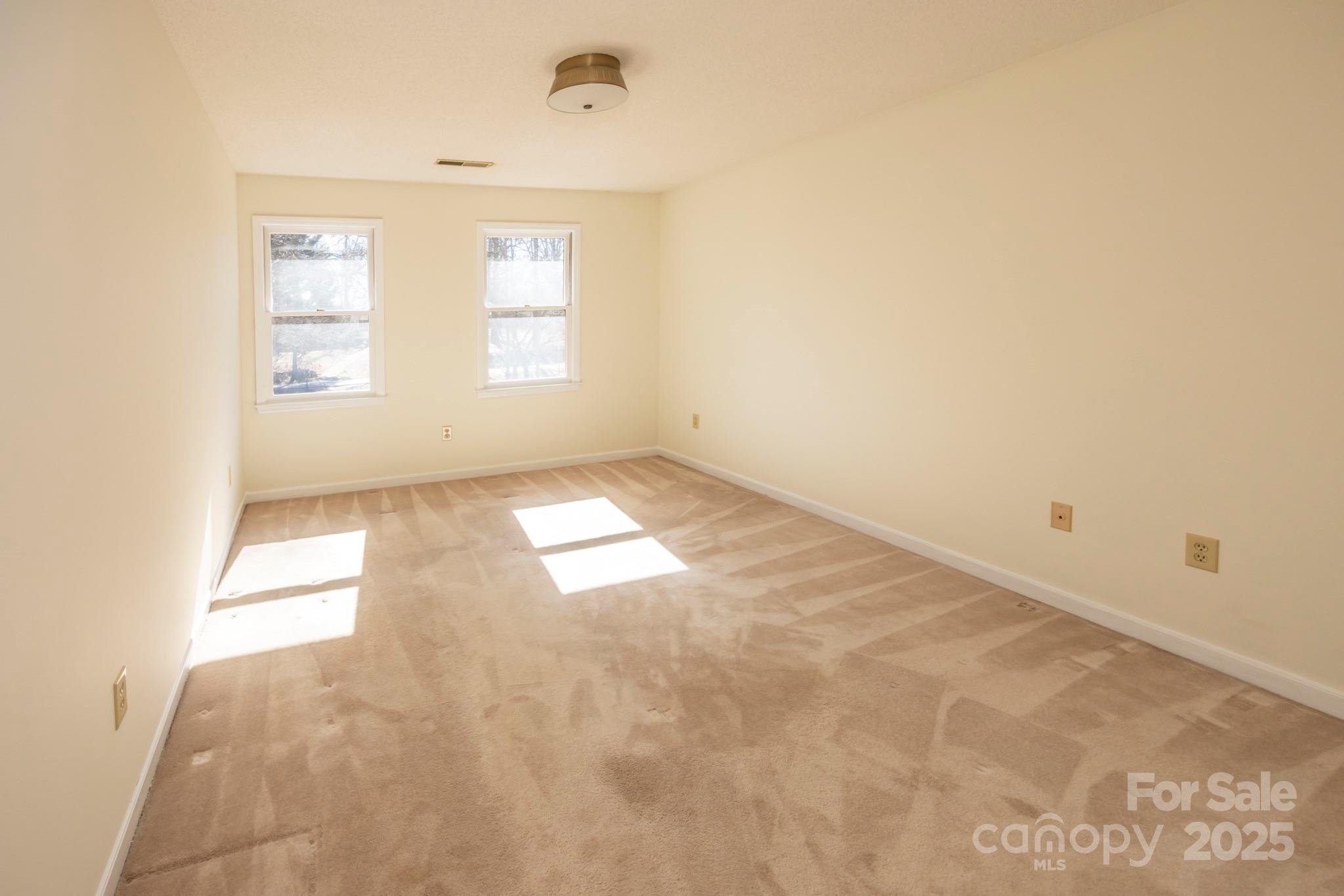 395 Thompson Road Rutherfordton, NC 28139 - Photo 19 of 25 an empty room with windows