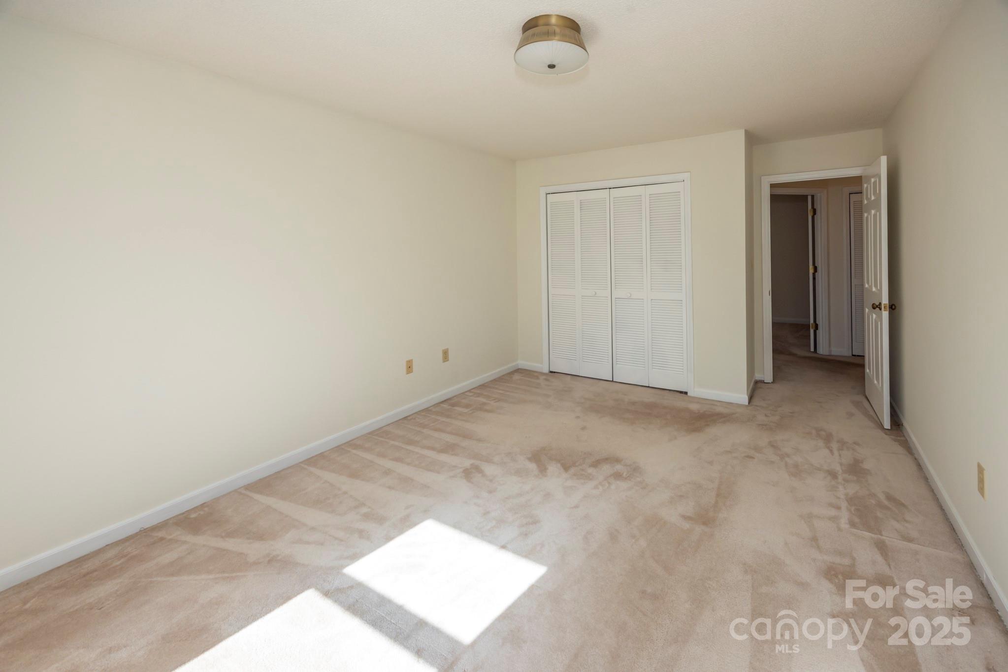 395 Thompson Road Rutherfordton, NC 28139 - Photo 20 of 25 an empty room with a natural light